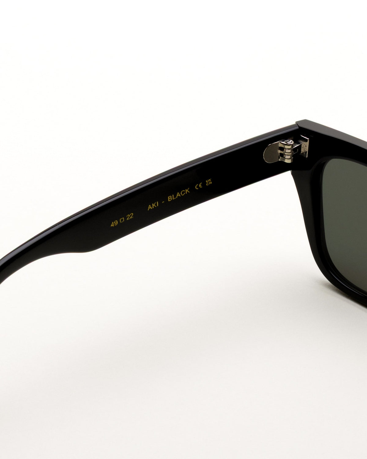 Aki Black - green solid lens