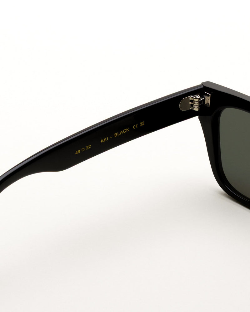 Aki Black - green solid lens