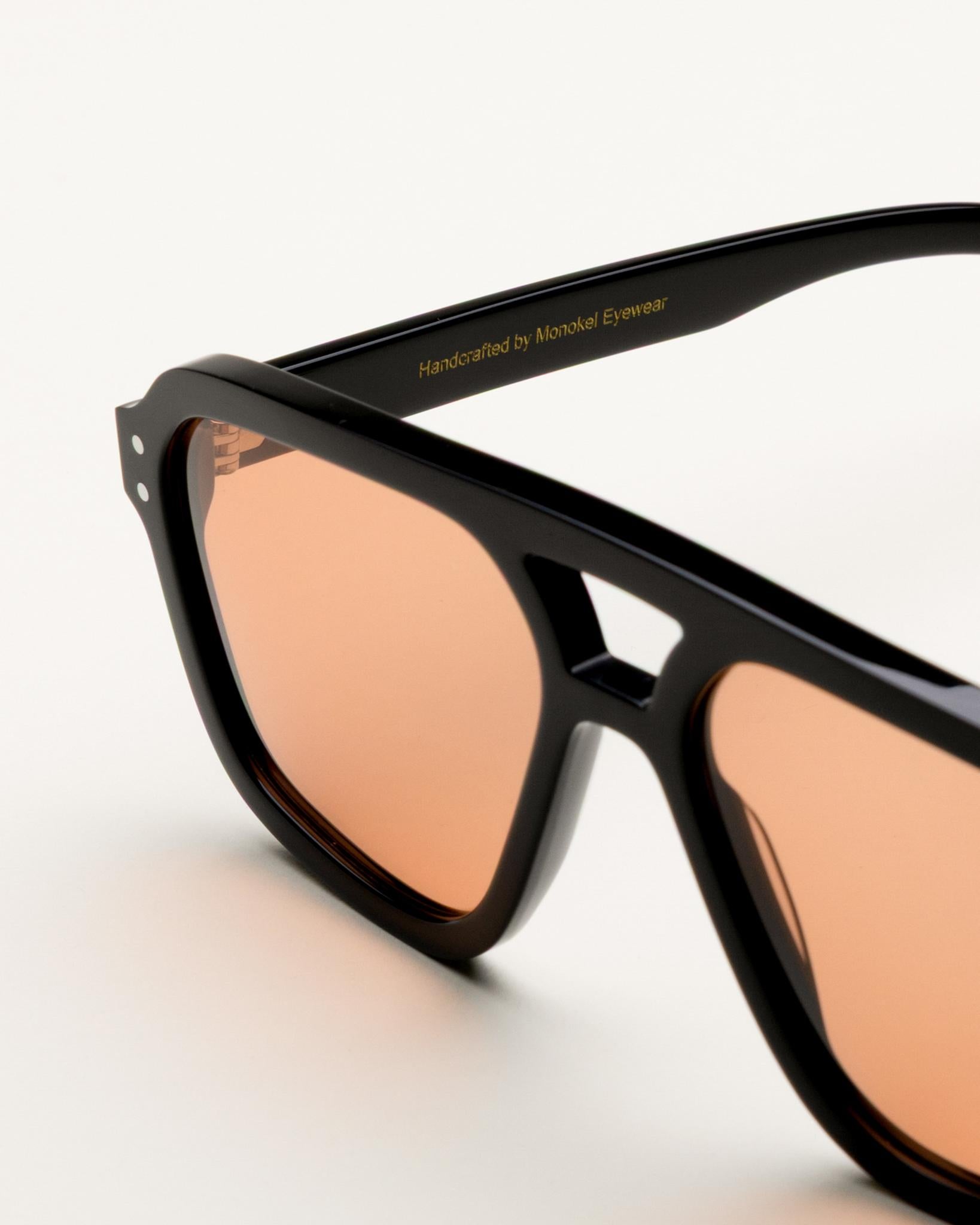 Jet Black - orange solid lens