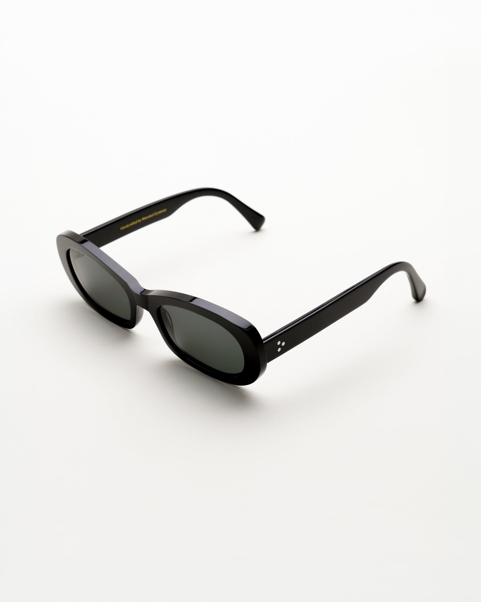 Belle Black - green solid lens