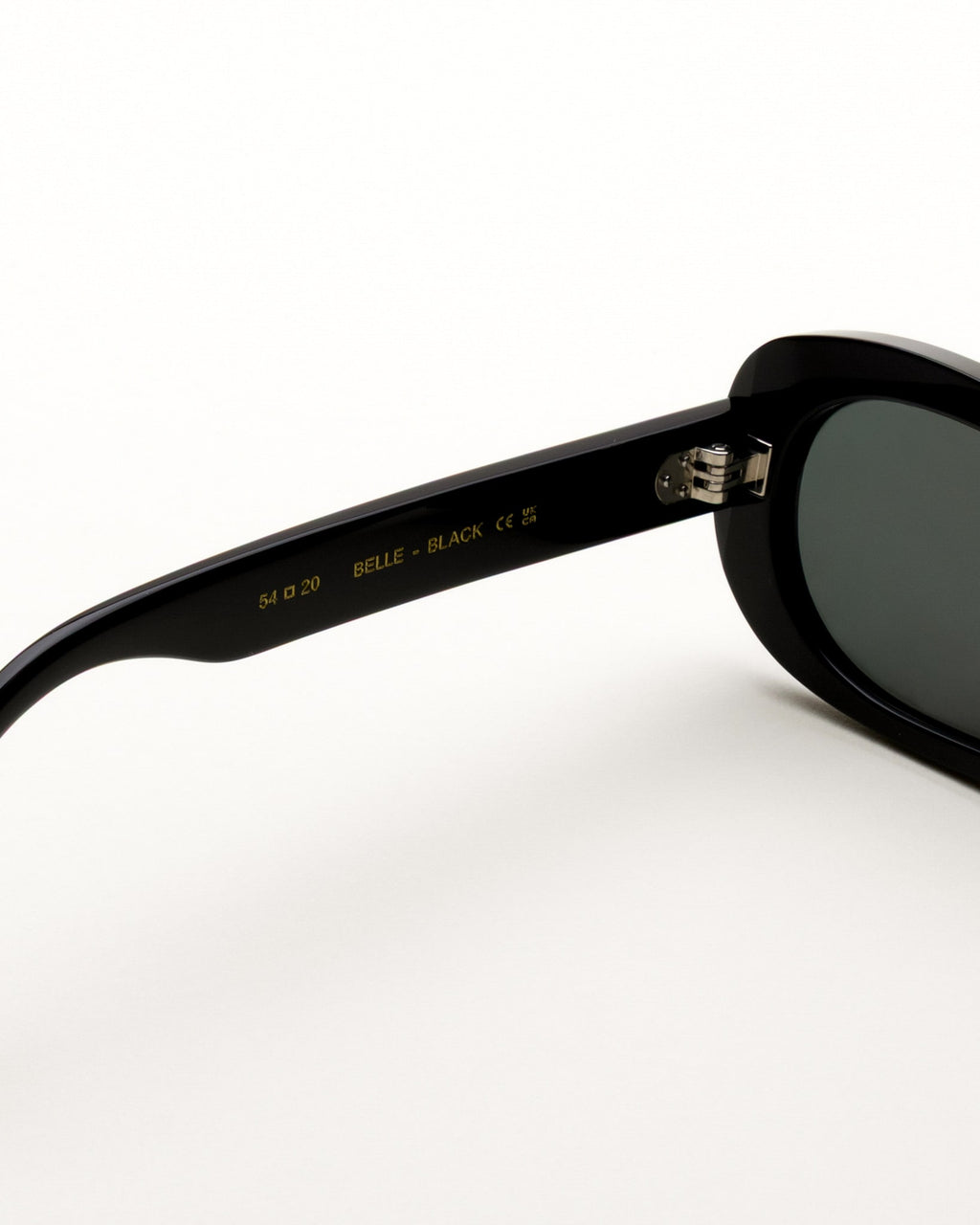 Belle Black - green solid lens