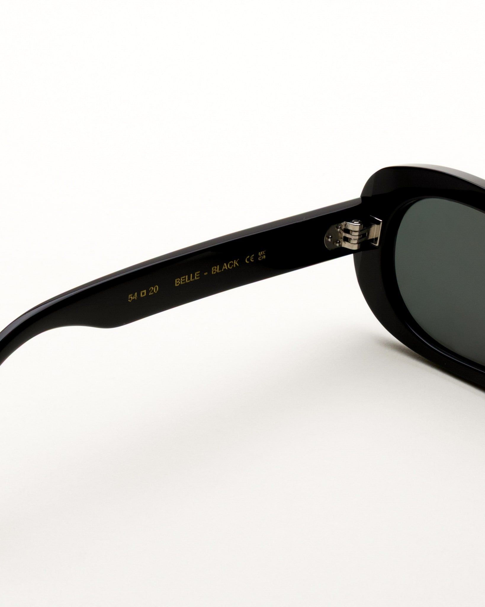 Belle Black - green solid lens