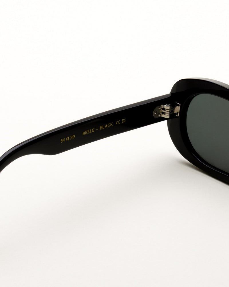Belle Black - green solid lens