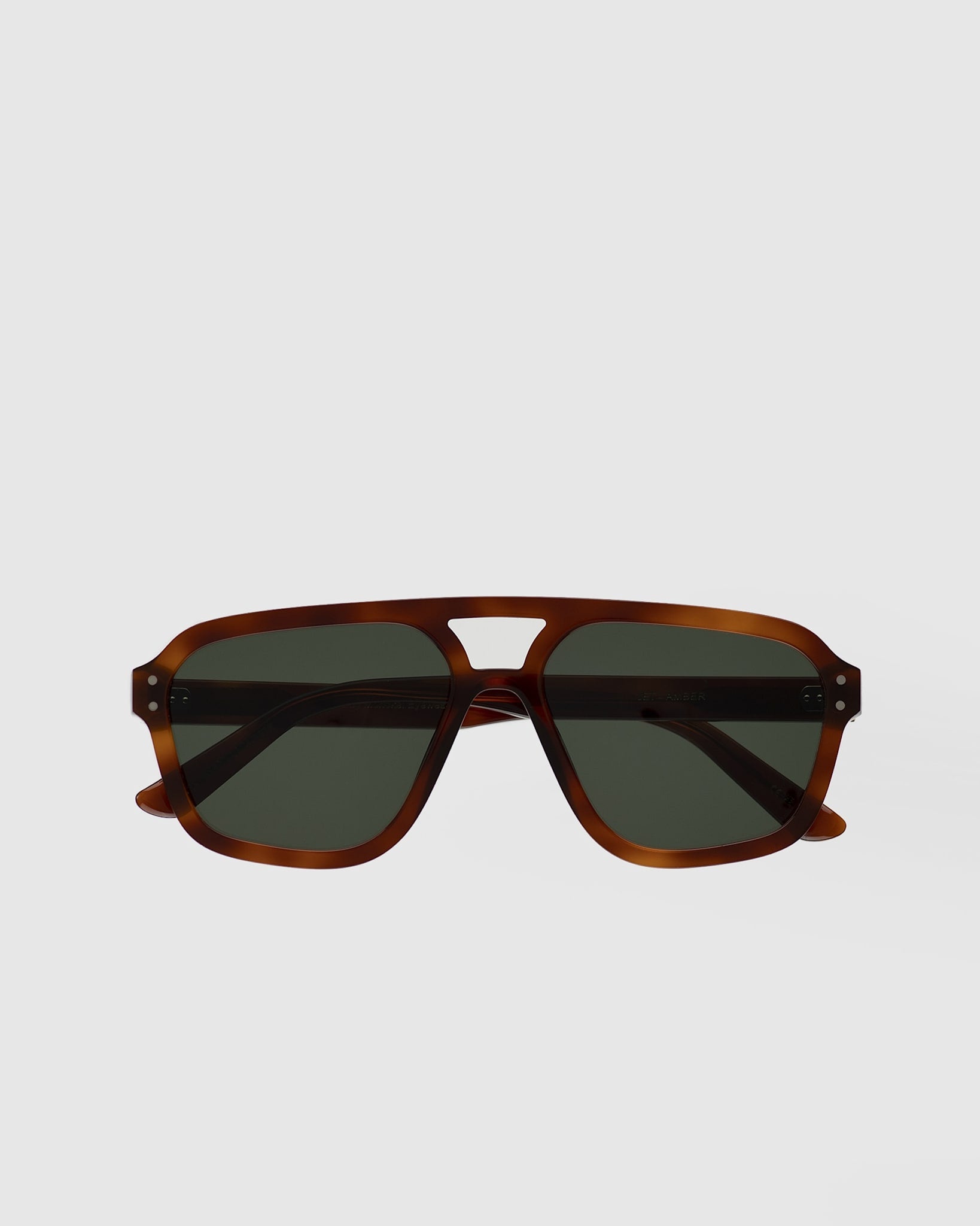 Jet Amber - green solid lens