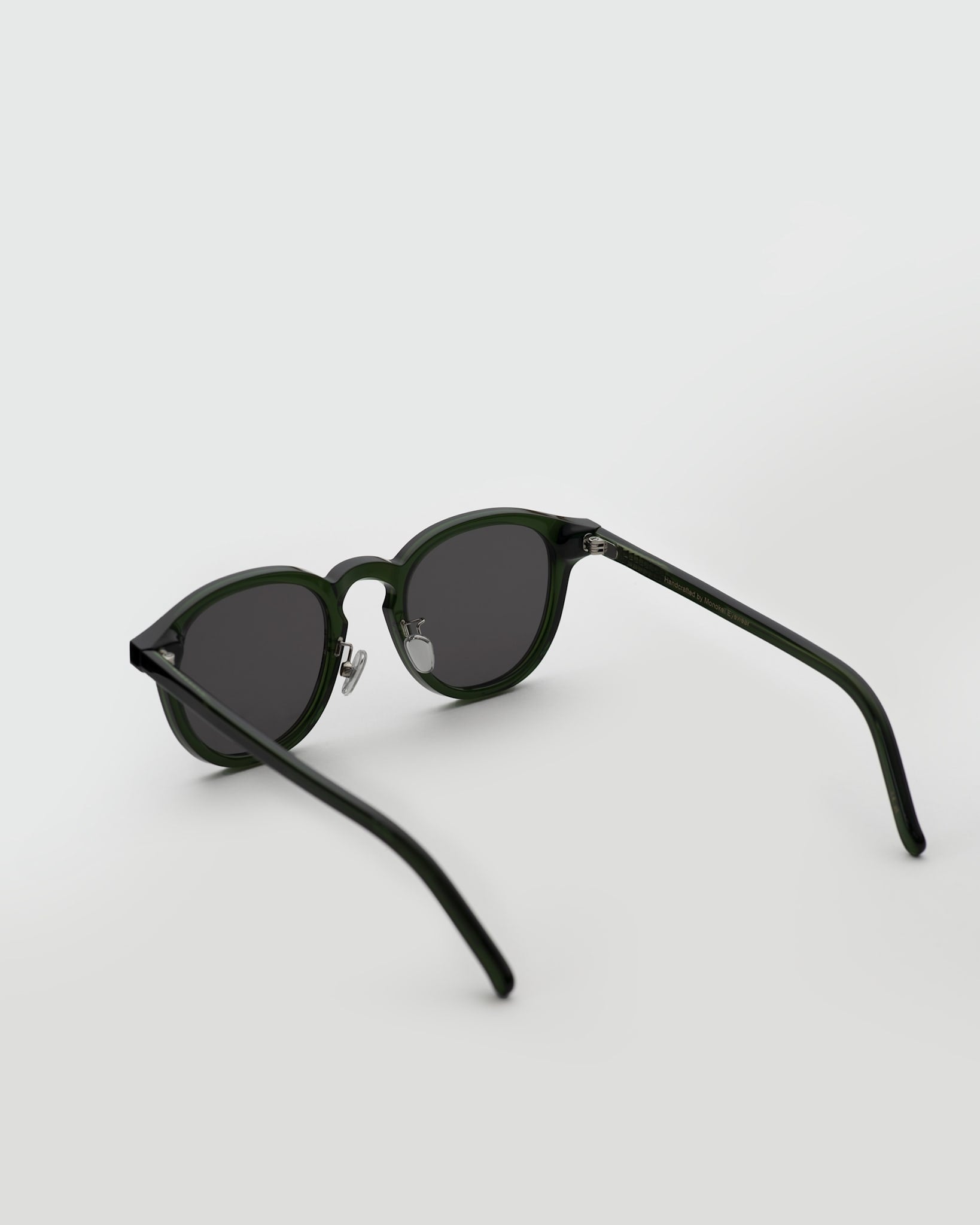 Nelson Bottle Green - grey solid lens