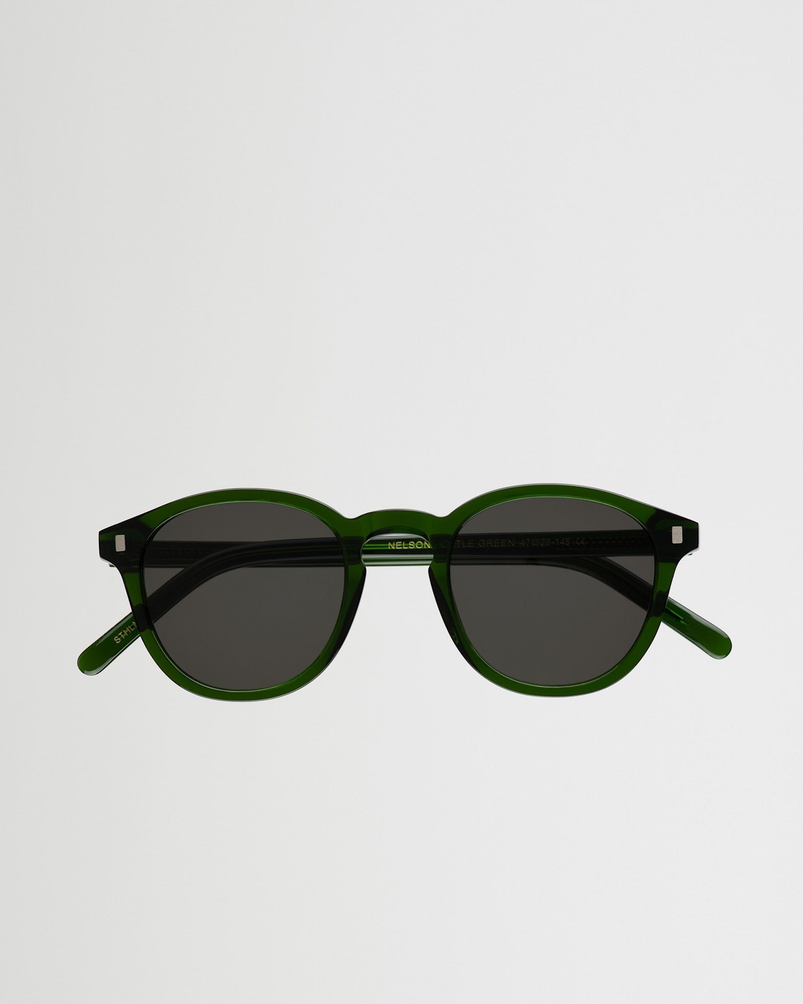 Nelson Bottle Green - grey solid lens