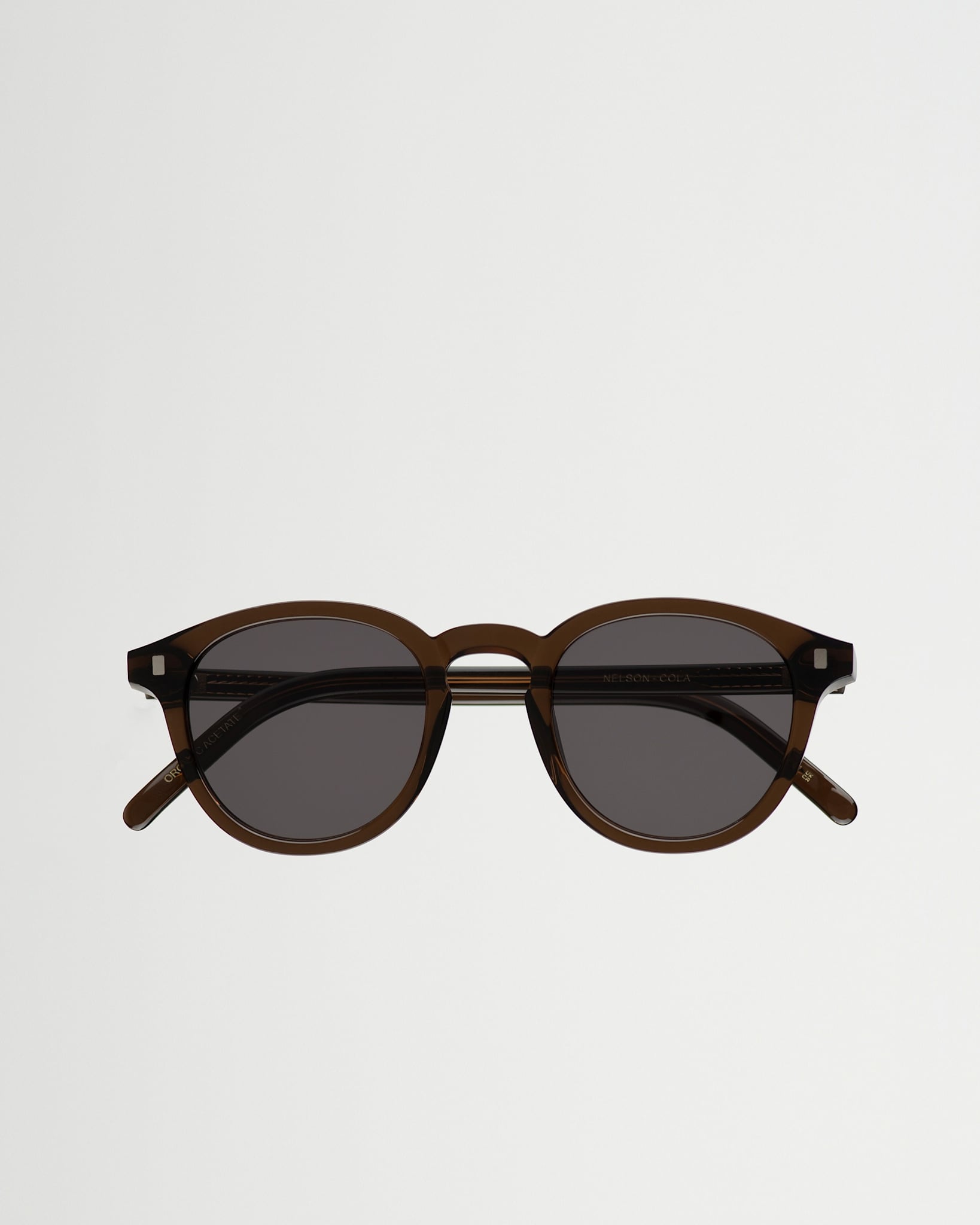 Nelson Cola - grey solid lens